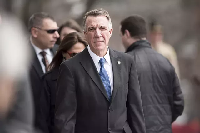 Gov. Phil Scott arrives at the statehouse for the bill-signing ceremony. - JOSH KUCKENS