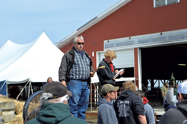 Ron Wright auctioning off farm equipment - PAUL HEINTZ