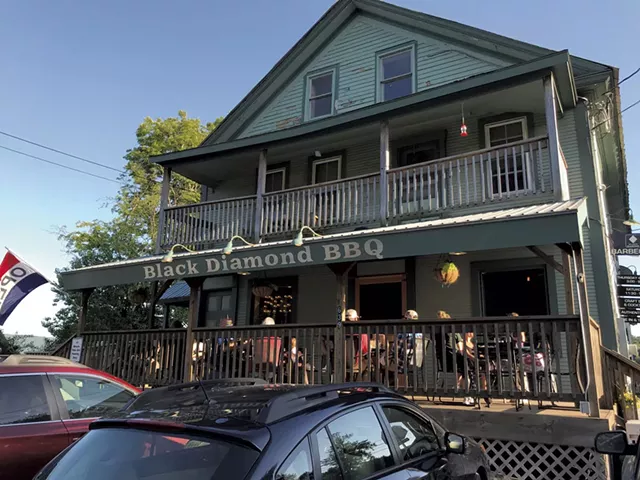 Front porch dining at Black Diamond Barbeque - SALLY POLLAK