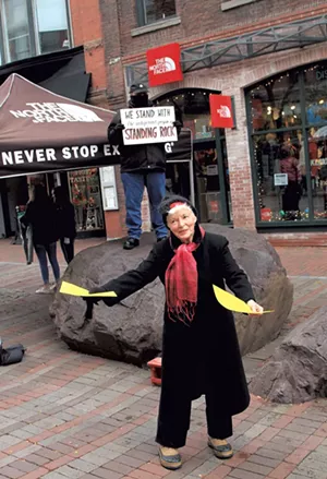 Robin Lloyd handing out flyers on Church Street with Juan Carlos Vallejo in 2016 - COURTESY OF JESSE LLOYD GUMA