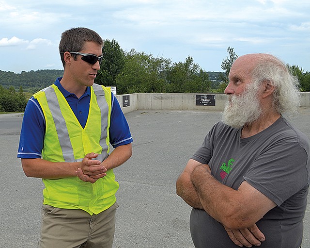 Landfill general manager Jeremy Labbe (left) speaking with Chris Jacobs - MOLLY WALSH