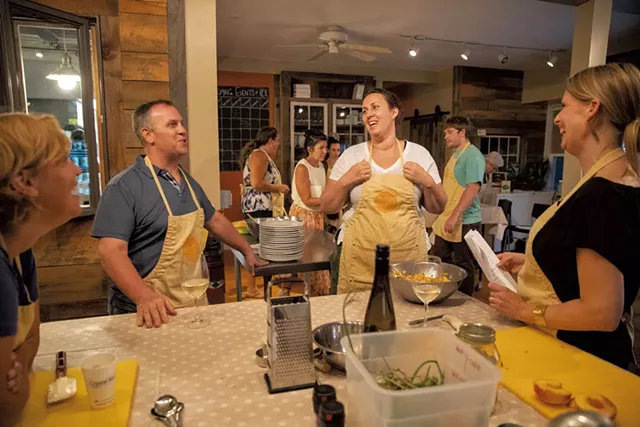 Chef Cara Chigazola Tobin (center) with students before dinner - JAMES BUCK