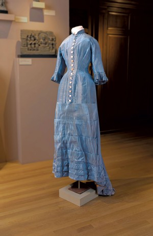 Iridescent blue silk dress with mother-of-pearl buttons from 1878 - COURTESY OF THE FLEMING MUSEUM OF ART