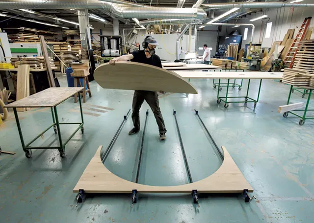 Matt Gardiner preparing to join two halves of a tabletop together at Vermont Farm Table in Bristol - GLENN RUSSELL