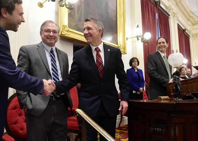 Sen. Tim Ashe, left, shakes Gov. Phil Scott's hand at the governor's budget address on January 24, 2019. - JEB WALLACE-BRODEUR
