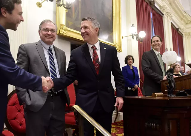 Sen. Tim Ashe, left, shakes Gov. Phil Scott's hand at the governor's budget address on January 24, 2019. - JEB WALLACE-BRODEUR