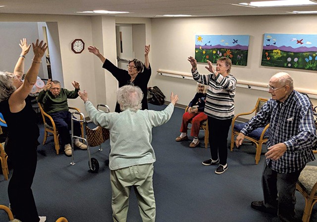 Residents during an exercise class - COURTESY OF THE LIVING WELL GROUP