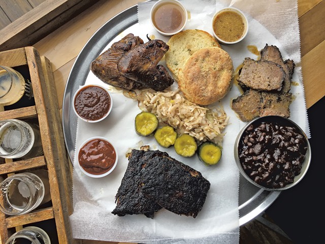Barbecue platter and beer flight at Hired Hand Brewing - MELISSA PASANEN