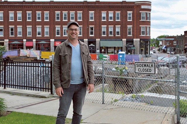 David Hohenschau in front of construction in downtown Middlebury - SABINE POUX