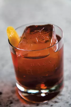 Freshly branded ice in a negroni - DARIA BISHOP