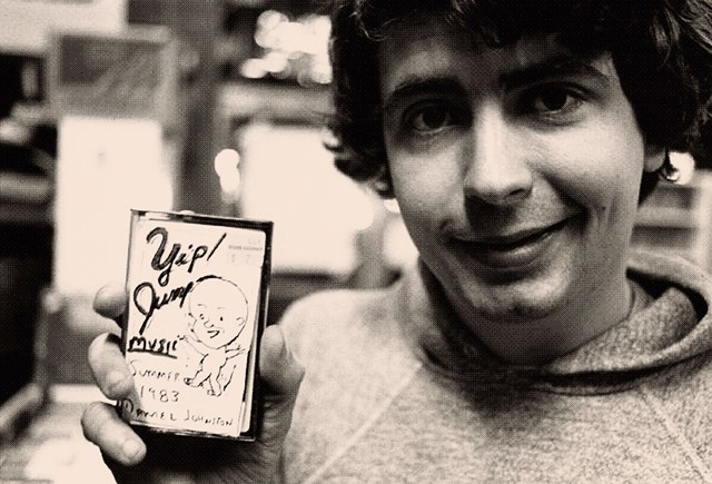 A young Daniel Johnston holding one of his homemade cassettes - COMPLEX / THIS IS THAT PRODUCTIONS