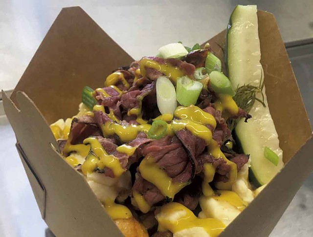Smoked pastrami, yellow beer mustard and pickle poutine - COURTESY OF VULGAR DISPLAY OF POUTINE
