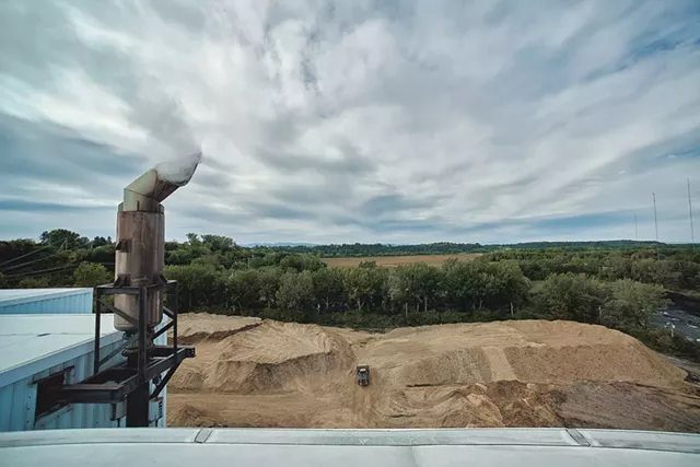 Woodchip piles outside McNeil