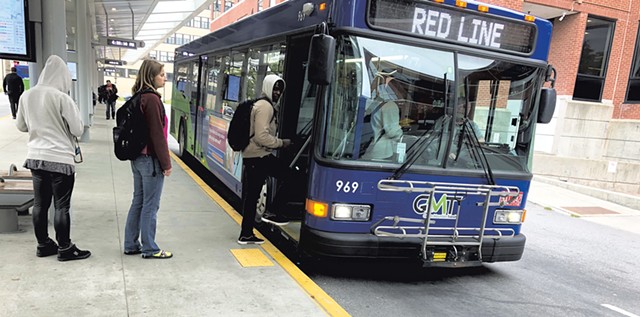 Passengers boarding at the Green Mountain Transit center in downtown Burlington - MOLLY WALSH