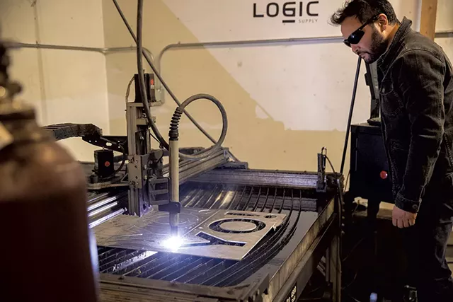 Elliott Katz working with the plasma cutter - JAMES BUCK