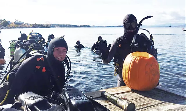 Sarah Bangs and Padric Hartnett competing in the carving contest - COURTESY OF PHILLIP PETERSON