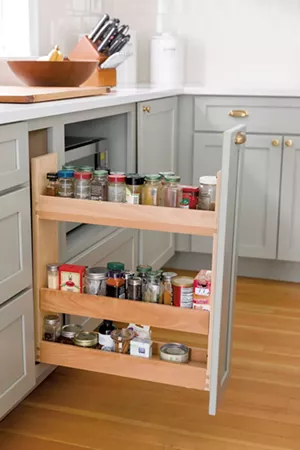A hidden spice rack cabinet - OLIVER PARINI