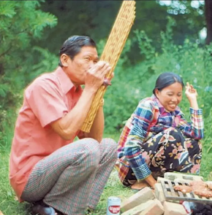 Souphine playing the khene