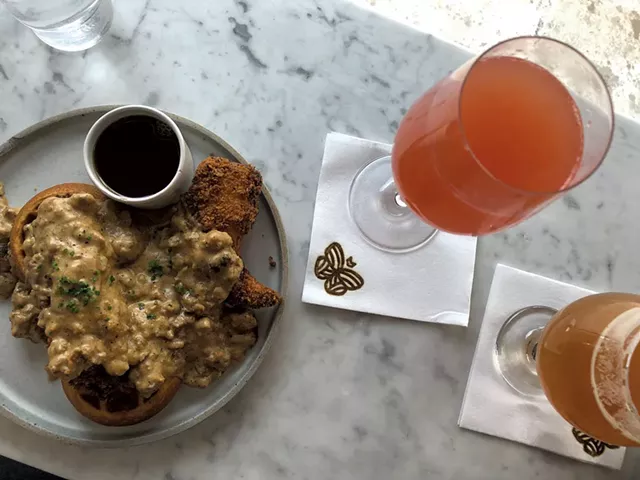 Half order of chicken and waffles at Monarch & the Milkweed, with brunch beverages - JORDAN BARRY