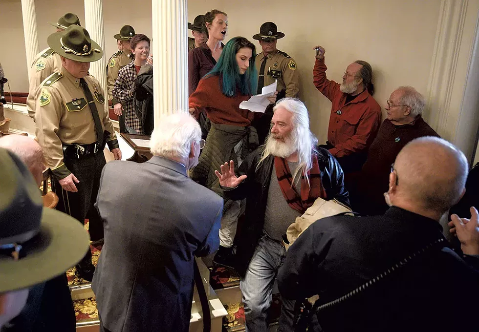 Extinction Rebellion activists at Gov. Phil Scott's State of the State address - JEB WALLACE-BRODEUR
