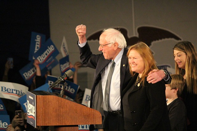 Sen. Bernie Sanders (I-Vt.) and Jane O'Meara Sanders at a campaign watch party in Des Moines, Iowa, on Monday night - PAUL HEINTZ