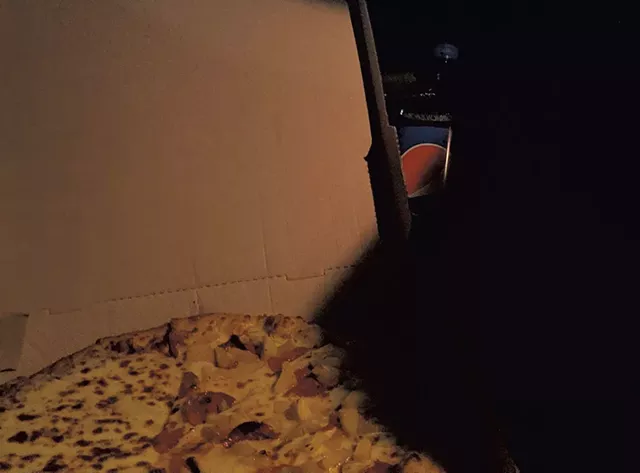 The picked-up pizza - REDDIT