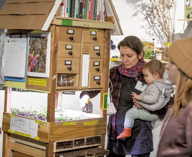 "Next Epoch Seed Library" co-collaborator Ellie Irons with her daughter - LUKE AWTRY