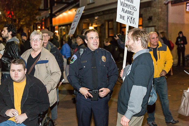 Burlington Police Chief Brandon del Pozo attending a rally at which residents protest KKK fliers - OLIVER PARINI