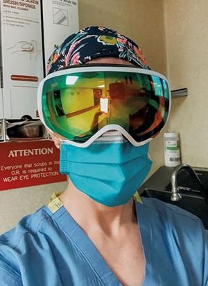Surgeon Catherine Logan, MD wearing a pair of donated goggles. - PHOTOS COURTESY OF BURTON SNOWBOARDS