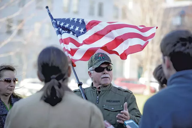 Rick Lawrence demonstrates against allowing Syrian refugees into Vermont - JEB WALLACE-BRODEUR