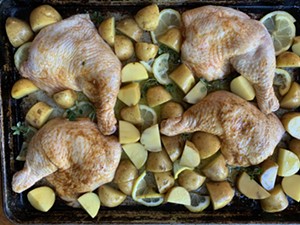 Sheet pan chicken heading into the oven - MELISSA PASANEN
