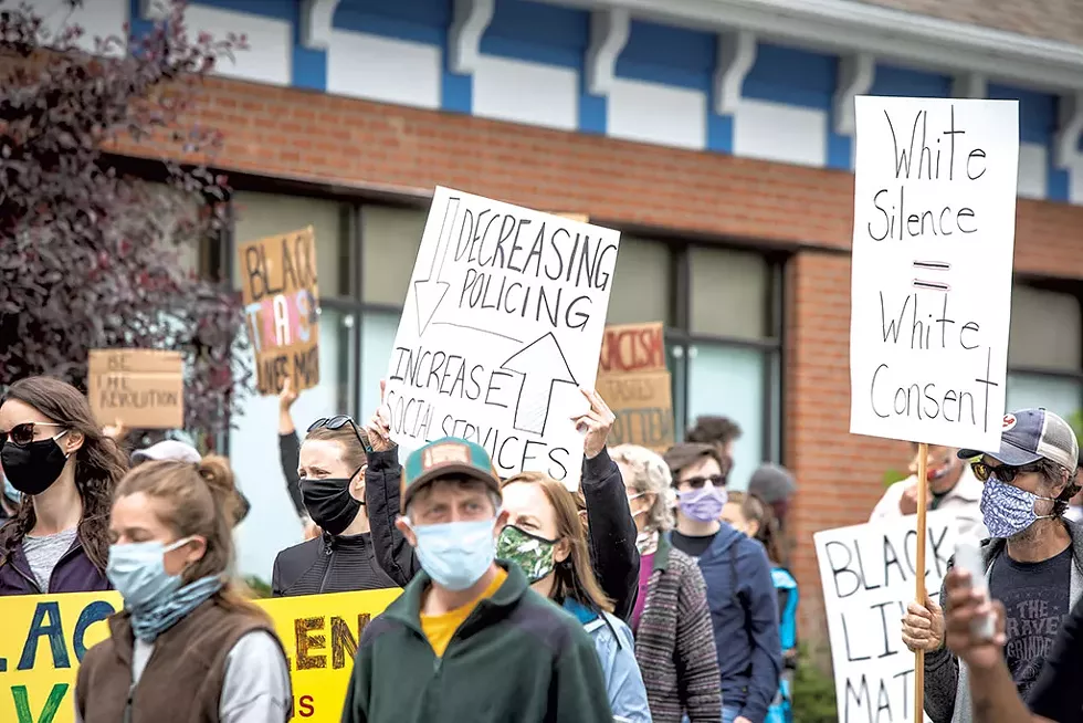 Protesters marching Saturday in Colchester - LUKE AWTRY