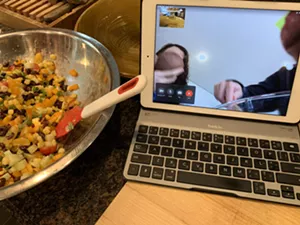 Juggling new baby with cooking - MELISSA PASANEN ©️ SEVEN DAYS