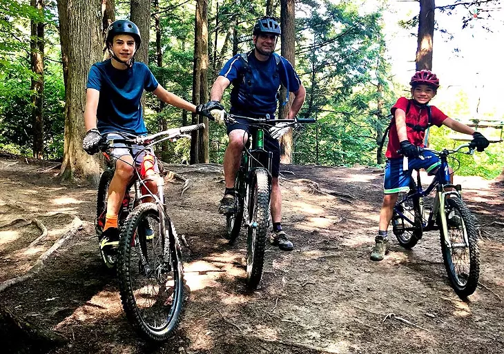 Bousquet and his boys mountain biking - BROOKE BOUSQUET