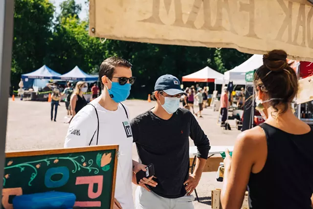 Local Maverick founder Ryan Nakhleh (left) and team member Alex Farrell shopping at the Hudak Farm stand at the Burlington Farmers Market - CURRAN MCKEE, COURTESY OF RYAN NAKHLEH