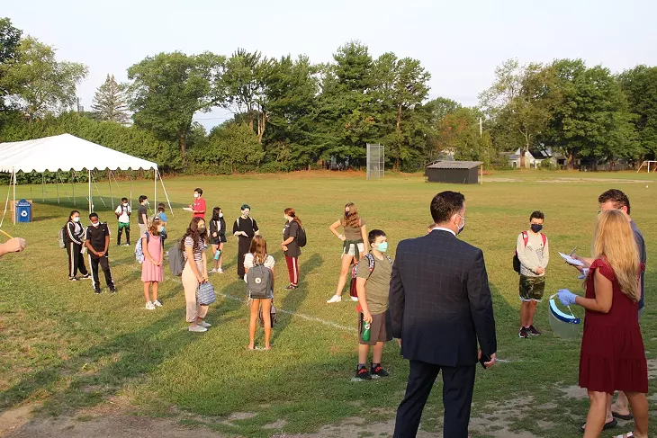Students lining up for health checks on the first day at Lyman C. Hunt Middle School in Burlington - COURTESY OF BURLINGTON SCHOOL DISTRICT