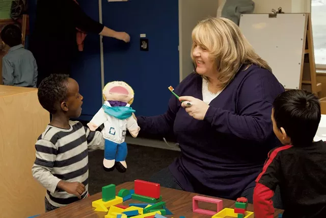 A lesson on brushing teeth at Franklin Square Early Learning Center in Burlington - COURTESY OF CHAMPLAIN VALLEY HEAD START
