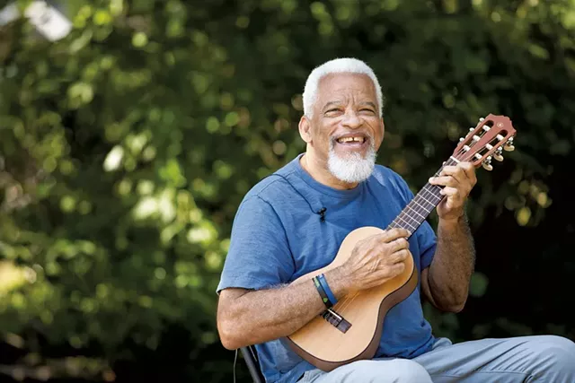 Musician Michael Dyke says he never leaves the house without an instrument in hand - CAT CUTILLO