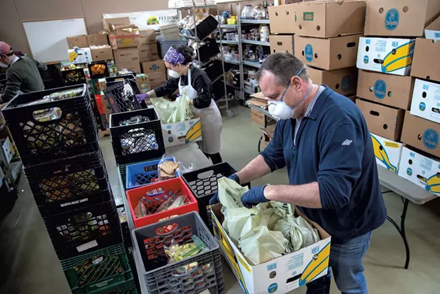 Packing food at Feeding Chittenden in April - FILE: JAMES BUCK