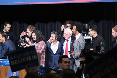 Sanders and supporters sing "This Land Is Your Land" at a concert in Henderson, Nevada. - PAUL HEINTZ