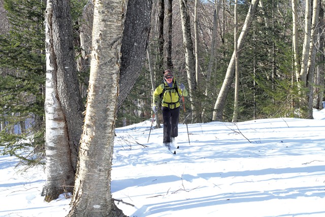 A cross-country skier - COURTESY OF UMIAK OUTDOOR OUTFITTERS&#10;A SNOW TUBER