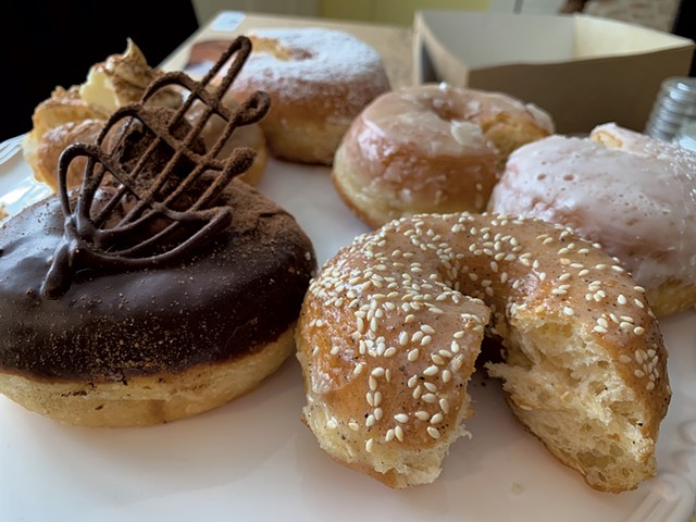 Chocolate mocha truffle (left), honey cardamom (right) and others from Local Donut - MELISSA PASANEN