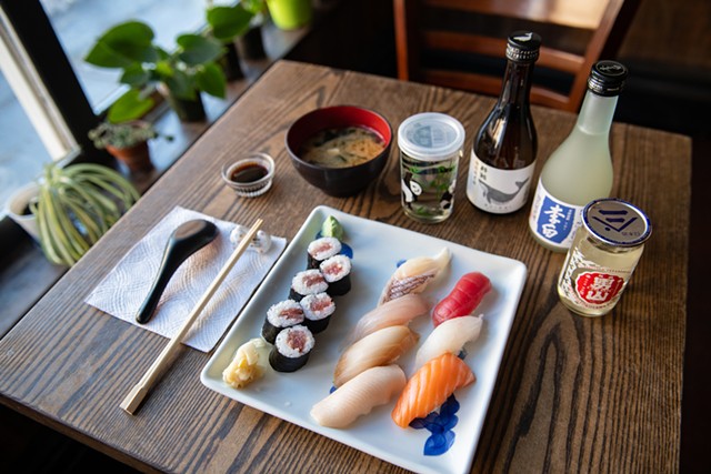 A sushi assortment with miso soup and a variety of drinks at Bento - DARIA BISHOP