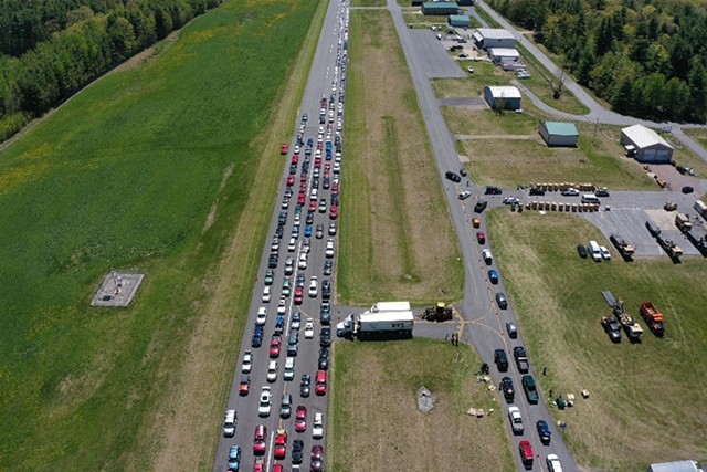 Cars line up to get food during a Farmers to Families Food Box drop last year - JAMES BUCK ©️ SEVEN DAYS