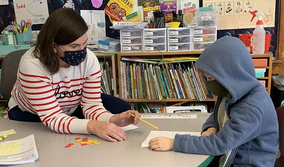 Kindergarten teacher Rachel Whalen helping a student at Union Elementary School in Montpelier - COURTESY OF RACHEL WHALEN