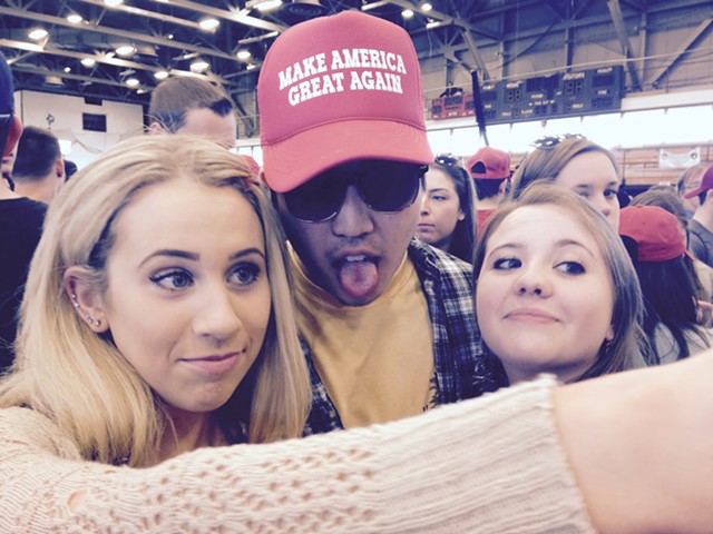 Plattsburgh State students Madelyn Egan, left, Mike Fish, center, and Kayleigh Church take a selfie at Trump rally. - MOLLY WALSH/SEVEN DAYS