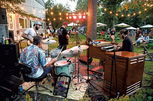 Zach Nugent performing outside at Stowe Cider - COURTESY