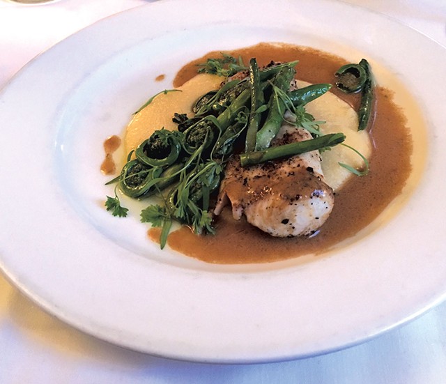 Wahoo, fiddleheads and asparagus at the Kitchen Table Bistro - PAMELA POLSTON