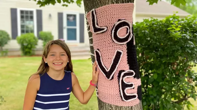Daniella D'Agostino with a "love" wrap in Williston - COURTESY OF GRETA D'AGOSTINO