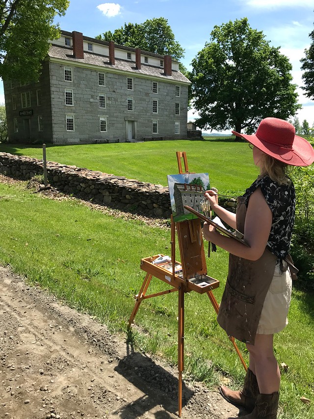 Artist Katie Runde painting the Old Stone House Museum - SALLY POLLAK ©️ SEVEN DAYS